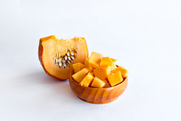 Pumpkin pieces on white background.