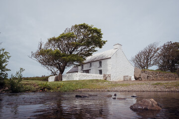 Welsh cottage near stream 