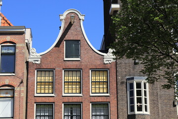 Fototapeta na wymiar Amsterdam Jordaan Historic House Facade with Bell Gable