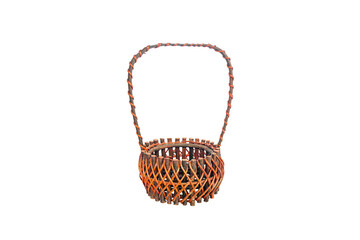 Red wicker basket isolate on a white background.