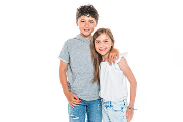 Fototapeta premium Portrait of cute girl and boy on studio white background