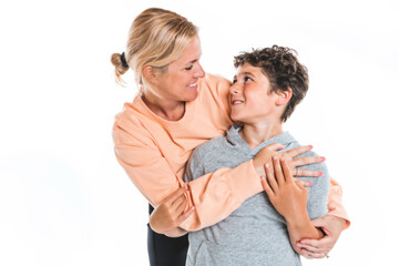Fototapeta premium young little son embracing his pretty mother