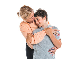Fototapeta premium young little son embracing his pretty mother