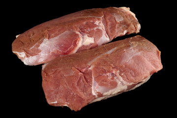 Two duck fillets shot on black