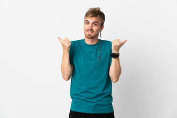Young handsome man isolated on white background with thumbs up gesture and smiling