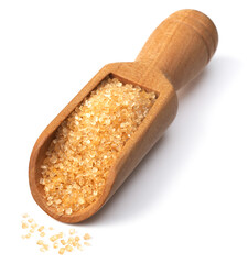 yellow sanding sugar in the wooden scoop, isolated on white background