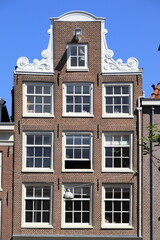 Fototapeta na wymiar Amsterdam Jordaan Historic House Facade with Neck Gable