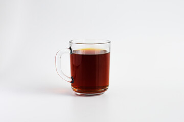 traditional Turkish brewed black tea in a glass cup with a handle. selective focus glass.
