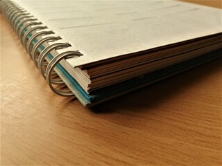 Spiral bound thick notebook horizontal portrait closeup shot