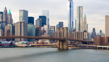 Fototapeta na wymiar Brooklyn Bridge over East River and Manhattan skyline, New York City.