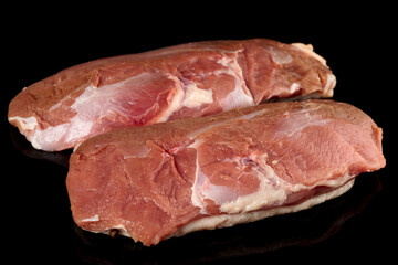 Two duck fillets shot on black