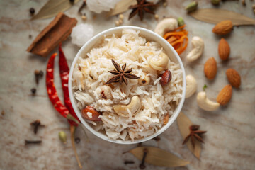 Close-up of Indian Basmati Rice or Kasmiri pulao (pulav) or Dry Fruits Pulao garnished with dry...
