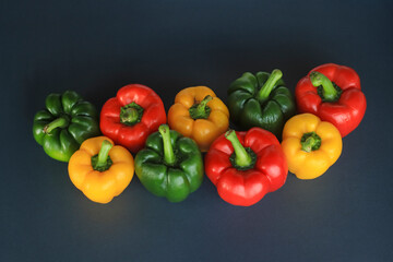 weet pepper, red, green, yellow paprika, isolated on black