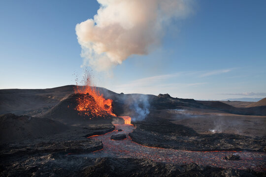 Reykjanes Peninsula, Iceland - May 4th 2021: Geldingadalir eruption and lava with plume of smoke