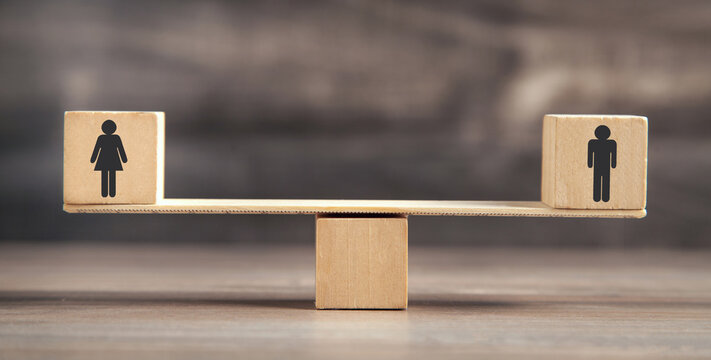 Balance scales made in from wooden cubes.