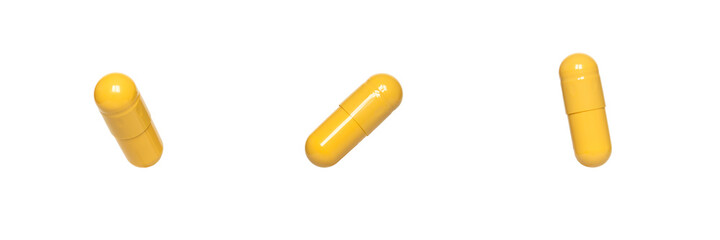 three yellow capsules or pills isolated on white background