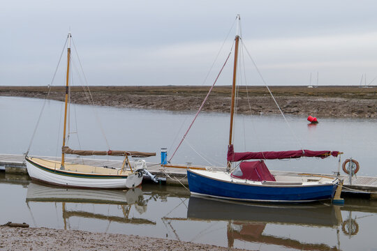 A pair of small sails boats