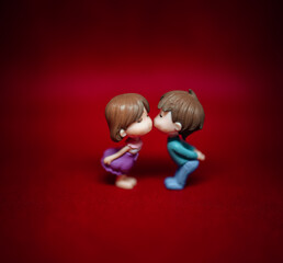 child playing with toy love kiss romantic 