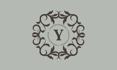 Elegant calligraphic ornament with an exquisite letter Y. Business sign, identity logo for a restaurant, boutique, hotel.