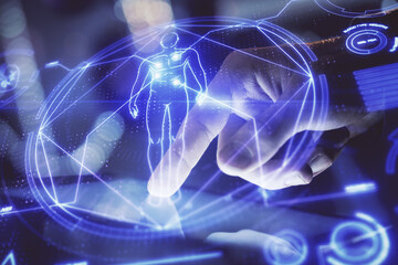 Double exposure of man's hands holding and using a phone and education theme drawing.