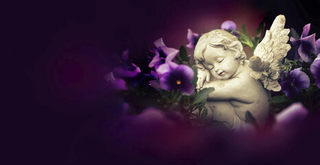 Condolence card with little angel sleeping in flowers, background with copy space