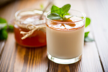 homemade yogurt in a glass and with jam