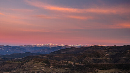 Fototapeta na wymiar Sunrise in the Bellmunt viewpoint. Views of the Pyrenees and the Puigmal summit (Osona, Barcelona province, Catalonia, Spain, Pyrenees)