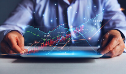 Businesswoman holding tablet with increase financial graph chart. Virtual hologram of statistics. Business growth and strategy.