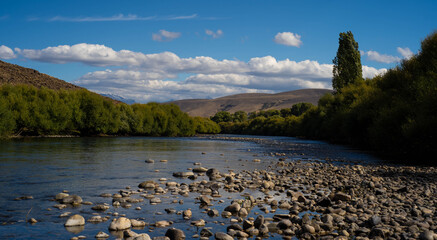 rocky shore of the Chimehuin river, Patagonia Argentina
