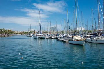 Fototapeta premium Sailing boat parking on the shore of Barcelona, summer background