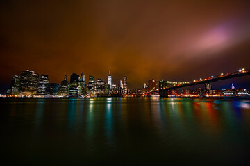 Manhattan, Financial District, and Brooklyn Bridge, New York, at Night