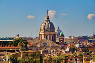 Fototapeta na wymiar San Carlo al Corso Towering over Roman Rooftops