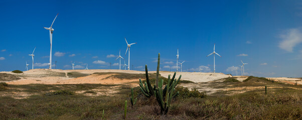Panoramic view of large wind turbines producing clean and sustainable energy, clean energy future....