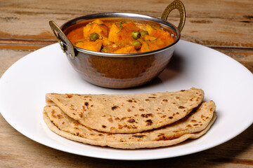 Indian style cottage cheese dish or curry with roti