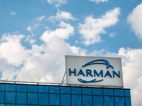 Bucharest/Romania - 07.18.2020: Harman International Industries logo against blue sky, in Bucharest