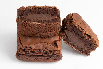 Brownies stuffed with chocolate (Brigadier) on white background.