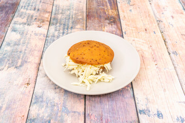 Arepita of sweet dough stuffed with cheese