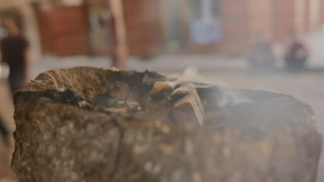 Oud incense burning detail 