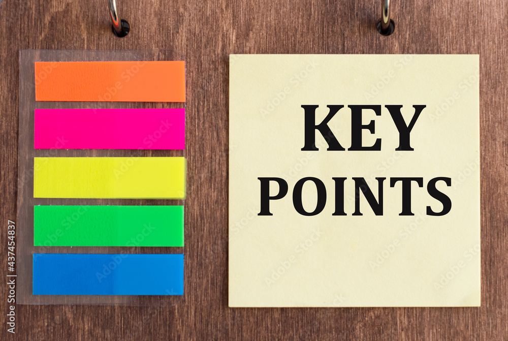 Poster yellow note paper with key points text on wooden background