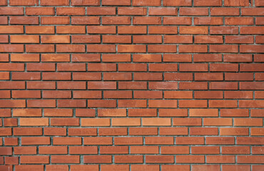 A grungy brick wall texture as background.