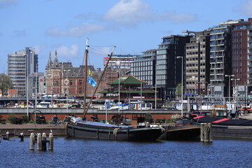 Amsterdam Oosterdok View with Boats, Buildings, and Central Station