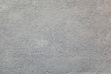 Gray cement plaster wall as background or texture.