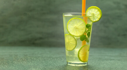 A glass of cold lemonade and ice