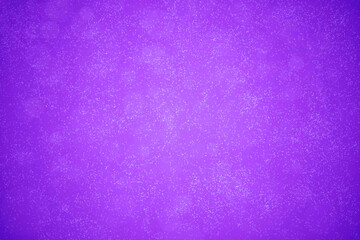 Abstract purple bokeh with snowfall background. 