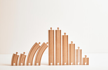 The large family concept: four childrens, parents, grandmother, grandfather, great-grandmother, great-grandfather, sister, brother. Wooden eco friendly toy railroad. Genus lifetime. Creative symbol