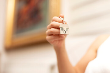 woman holding key