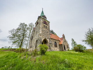 Fototapeta premium Neo gotic Church Of The Divine Heart Of The Lord in small village Borovnicka in Podkrkonosi region in Czech republic