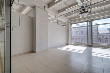 Modern white empty room interior with columns and panoramic windows.  room for office or store