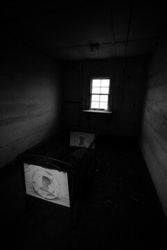 Cradle, Bassinet Black, And White In An Abandoned Room, NSW, Australia
