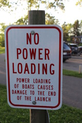 no power loading sign in a park
